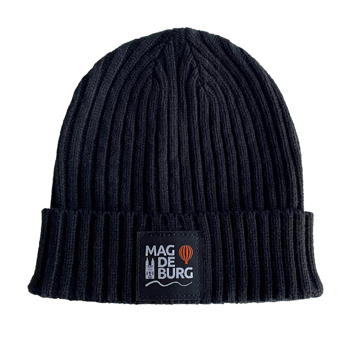 Schwarze Strickmütze MagdeBeanie mit Magdeburg-Logo und Heißluftballon, erhältlich im Magdeburg Shop.